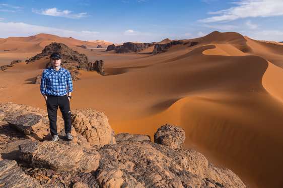 The photographer, sand dunes at Ouan Zaouatan, Tadrart region, Tassili n ́Ajjer National Park, Sahara, North Africa