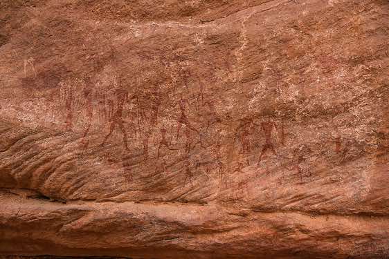 Rock painting of hunters and warriors, Neolithic rock art, Bovidian period, Tadrart region, Tassili n ́Ajjer National Park, Sahara, North Africa