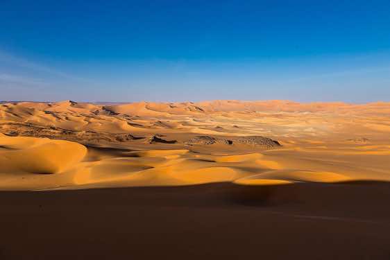 Sand dunes in different colours, southern Oued In Tehak, Tadrart region, Tassili n ́Ajjer National Park, Sahara, North Africa