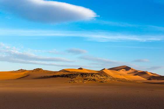 Sand dunes and claypan, playa, southern Oued In Tehak, Tadrart region, Tassili n ́Ajjer National Park, Sahara, North Africa
