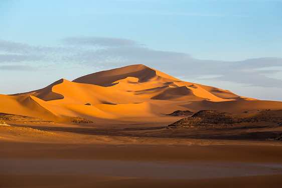 Sand dunes and claypan, playa, southern Oued In Tehak, Tadrart region, Tassili n ́Ajjer National Park, Sahara, North Africa