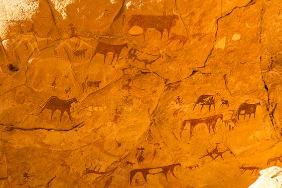 Prehistoric rock paintings, Manda Guéli Cave, Ennedi Mountains, northeastern Chad. Camels have been painted over earlier images of cattle, perhaps reflecting climatic changes