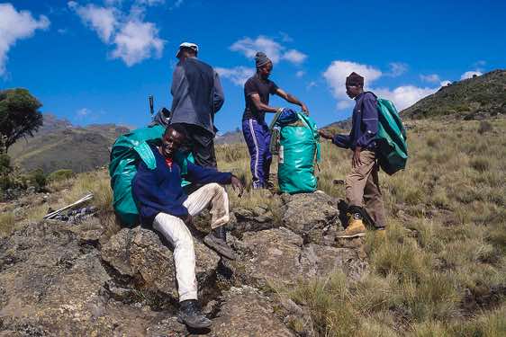 Group of porters taking a rest, Chogoria route