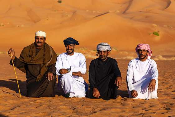Omani crew, Ali Wahibi (right), Amur al Rahawi (second from left), desert landscape, Rub al Khali, Empty Quarter, Dhofar region