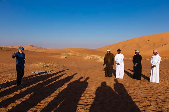 Tour guide Jerome Blösser and Omani crew, desert landscape, Rub al Khali, Empty Quarter, Dhofar region