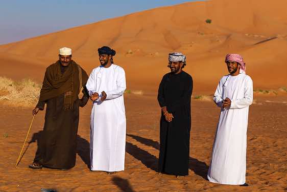 Omani crew, Ali Wahibi (right), Amur al Rahawi (second from left), desert landscape, Rub al Khali, Empty Quarter, Dhofar region