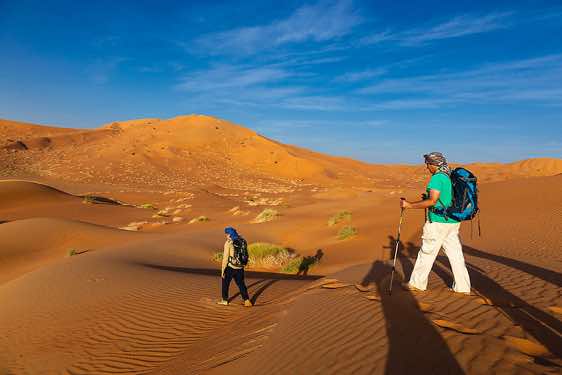 Jerome and Joachim hiking in the sand dunes, desert landscape, Rub al Khali, Empty Quarter, Dhofar region