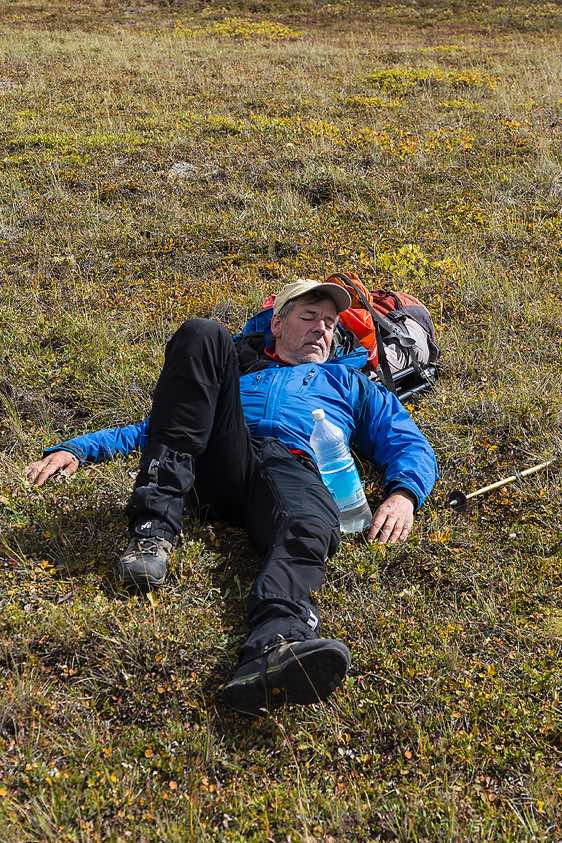 Tour guide Thorsten Kutschke having a nap, around Tolbachik trek, Klyuchevskoy Nature Park