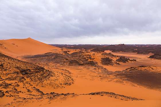 Sand dunes and rocks, Tadrart region, Tassili n ́Ajjer National Park, Sahara, North Africa