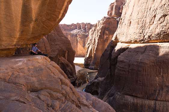 The photographer taking a break at Guelta d'Archei, Ennedi Mountains, northeastern Chad