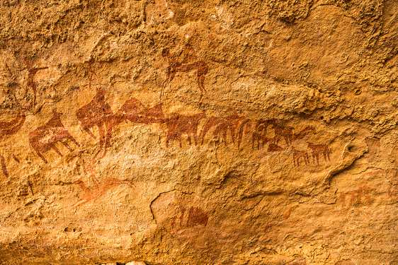 Rock painting of cattle, horses and riders, Terkei Cave, Ennedi, norteastern Chad