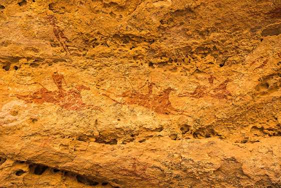 Rock painting of galloping horses and riders, Terkei Cave, Ennedi, northeastern Chad