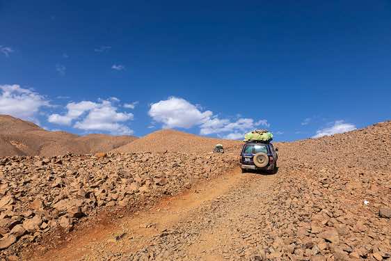 Driving through barren, but grandiose landscape on a appallingly bad road, Tibesti region