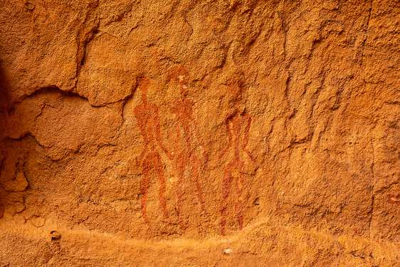Rock painting of three human figures, Gaora Hallagana, Ennedi, northeastern Chad