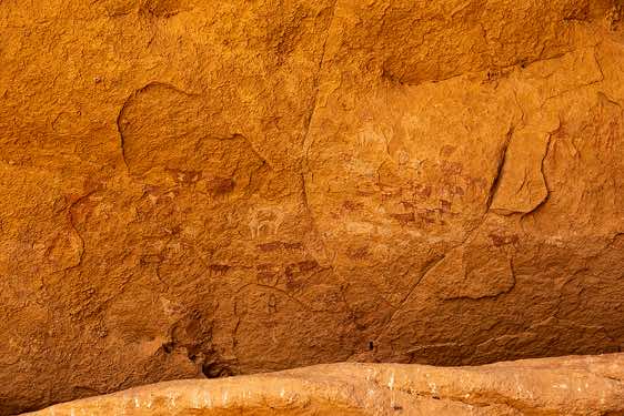 Rock painting showing herd of (red and white) infilled cows, Ennedi, northeastern Chad