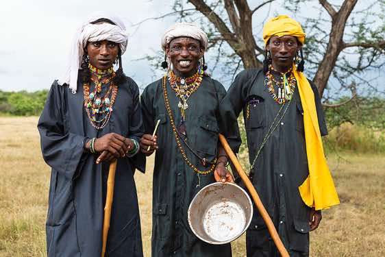 Wodaabe (Bororo) men asking for food at the Gerewol festival