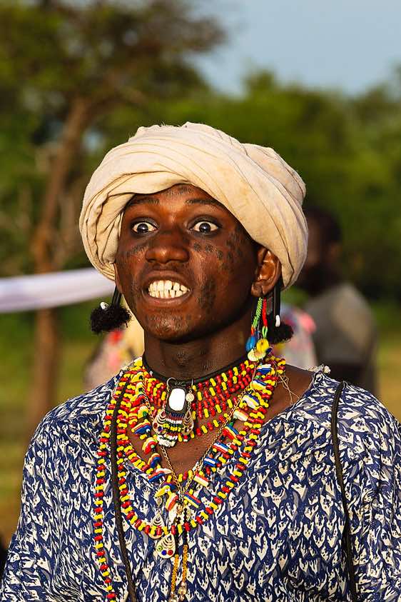 The male beauty ideal of the Wodaabe (Bororo) stresses tallness, white eyes and teeth - during the Gerewol festival the men will often roll their eyes and show their teeth to emphasise these characteristics