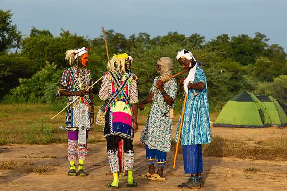 Wodaabe (Bororo) men getting dressed up for the Gerewol festival performances
