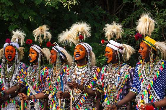 Wodaabe (Bororo) men chanting and dancing at the Gerewol festival