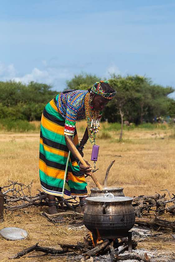 Wodaabe (Bororo) woman preparing food at the Gerewol festival