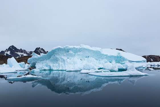 Iceberg reflecting in water, Ammassalik Island