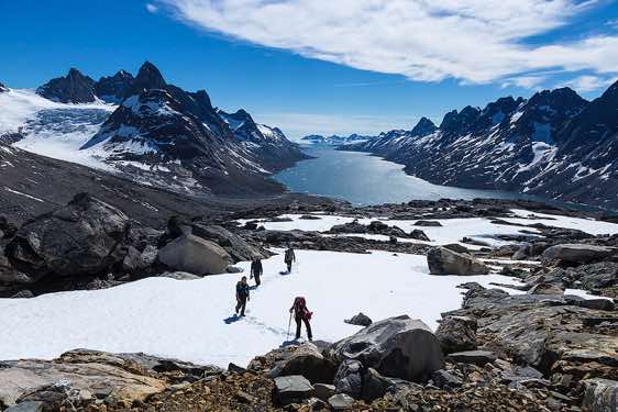 Group hiking in the mountains, Ikaasartivaq Strait