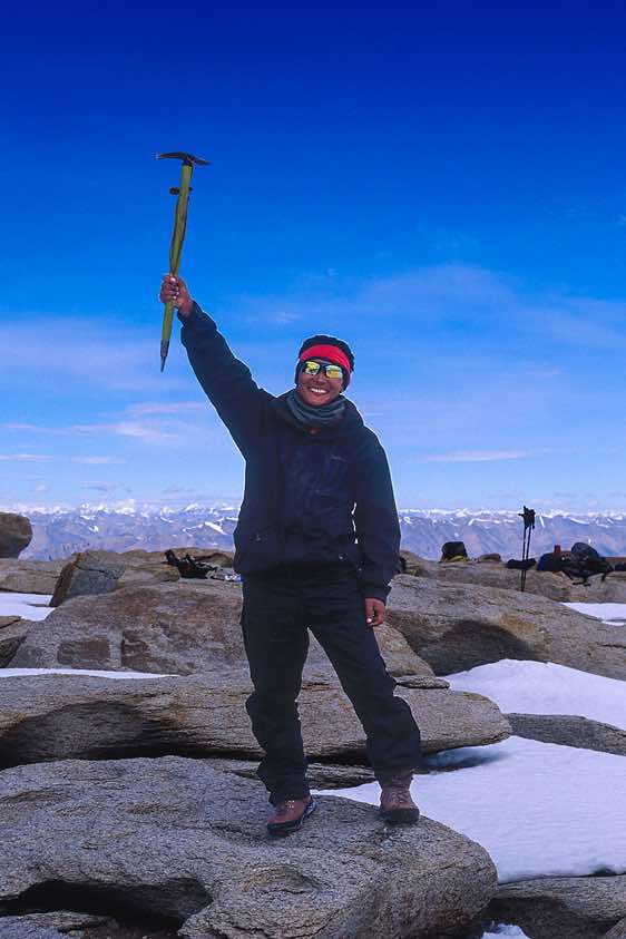 Nepali guide on top of Mentok Peak IV, 6090m, Rupshu region, Ladakh