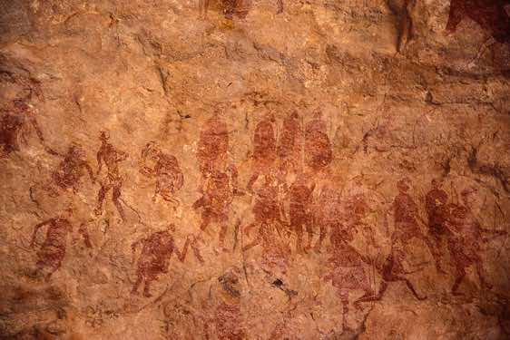 Painting that shows a crowd of running archers in the Wan Amil cave, Jabal Akakus