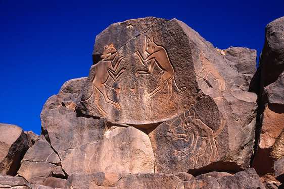 Fighting Cats rock carving, Wadi Matkhandush, Messak Settafet