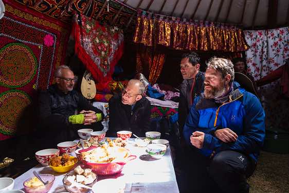 A richly set table inside a yurt, Tavan Bogd National Park, Altai Mountains, Western Mongolia