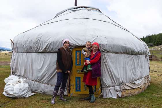 Nomads in front of their yurt, Tavan Bogd National Park, Altai Mountains, Western Mongolia