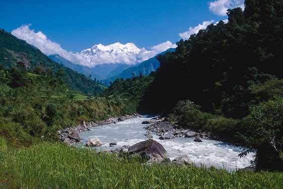 The trail heads up the Marsyandi river valley. Manaslu, 8163m, is in the background.