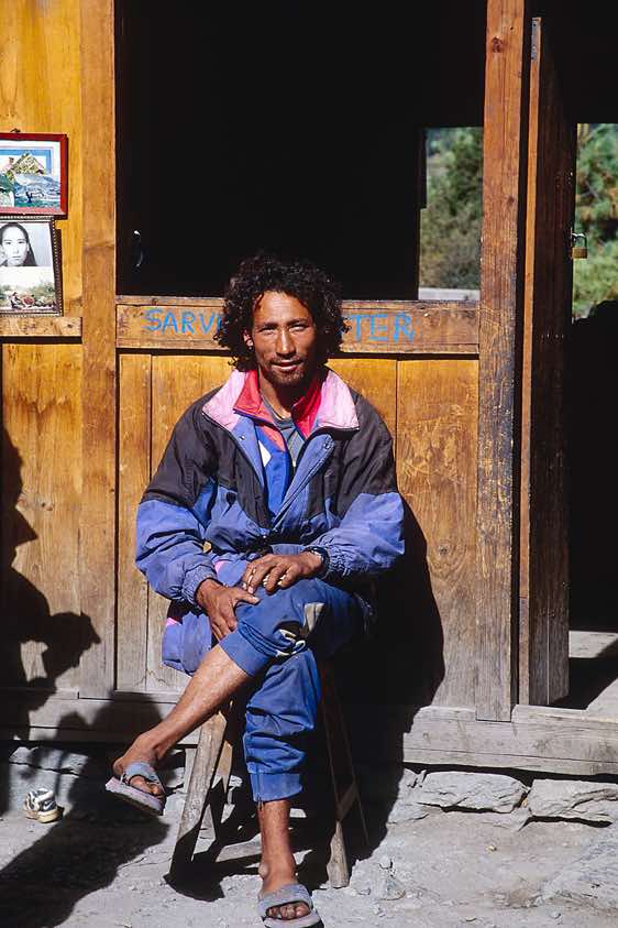Tibetan-looking lodge owner, Pisang, Manang Valley