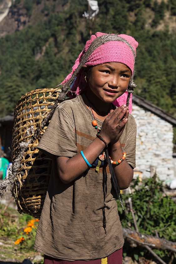 Girl with a bamboo basket (doko), Buri Gandaki Valley