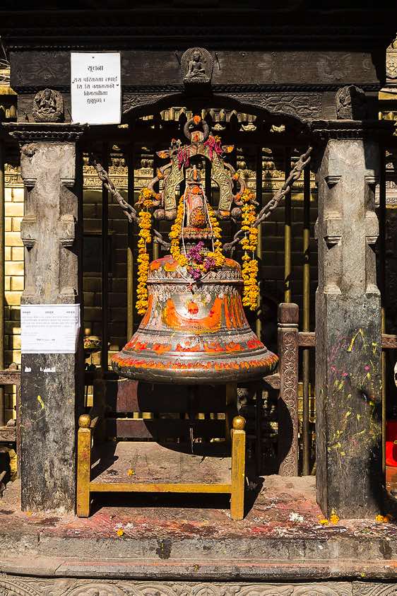 Bell inside the courtyard of the Golden Temple, Patan