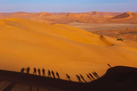 Hiking in the sand dunes, shadow outlines, desert landscape, Rub al Khali, Empty Quarter, Dhofar region
