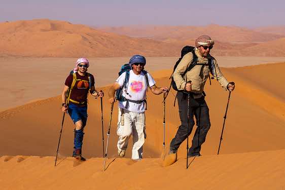 Marco, Joachim and Andreas hiking in the sand dunes, desert landscape, Rub al Khali, Empty Quarter, Dhofar region