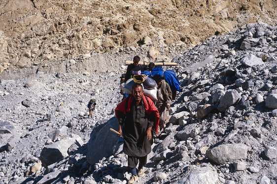 Group of porters on the Baltoro Glacier, Karakoram Mountains