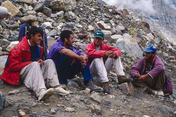 Local guide Ejaz Ali Khan (second from right) with a group of porters