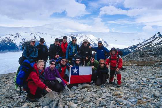 Trekking group on top of John Gardner pass, Torres Del Paine National Park, Chile