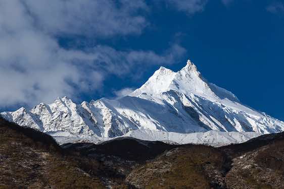Mount Manaslu, 8163m, seen on route from Sama (Samagaon) to Samdu in the Buri Gandaki Valley
