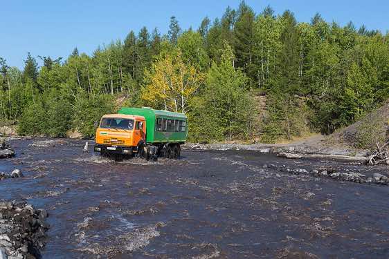Kamaz truck crossing a river
