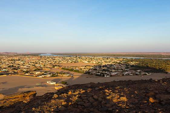 View from the top of Jebel Barkal at sunset, an isolated red sandstone mountain near the town of Karima, Northern Sudan