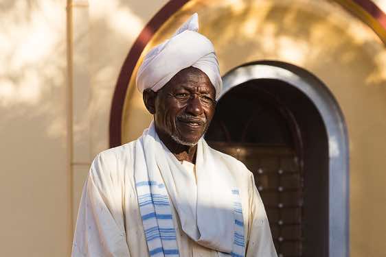 Old man in front of Mahdi's tomb, Khartoum