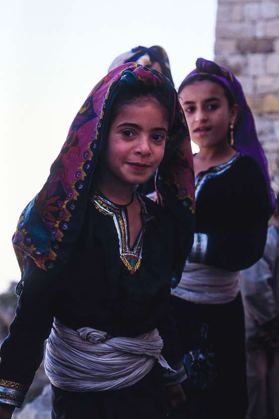 Girls in traditional dress, Jebel Rugab, Bura mountains
