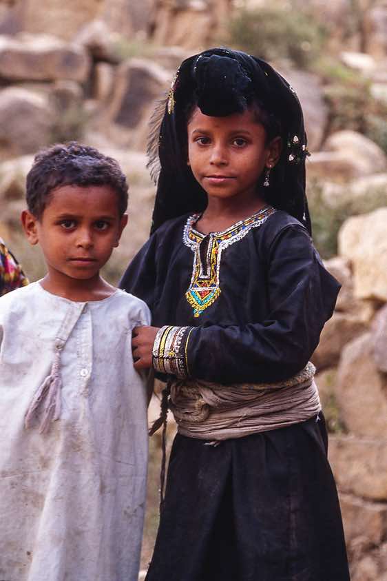 Girl in traditional dress, Jebel Rugab, Bura mountains