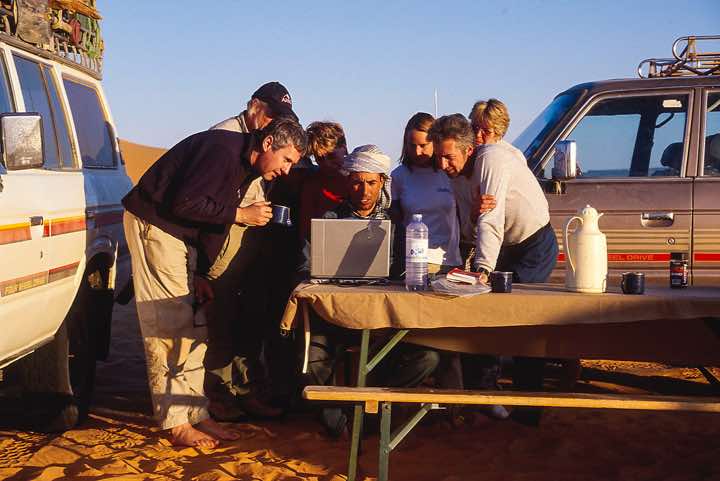 Libyan tour guide Jalal Azzabi at the centre of attention
