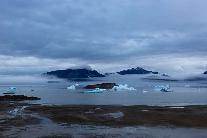 Sermilik Fjord in clouds, seen from campsite near Sermilik Research Station, Ammassalik Island