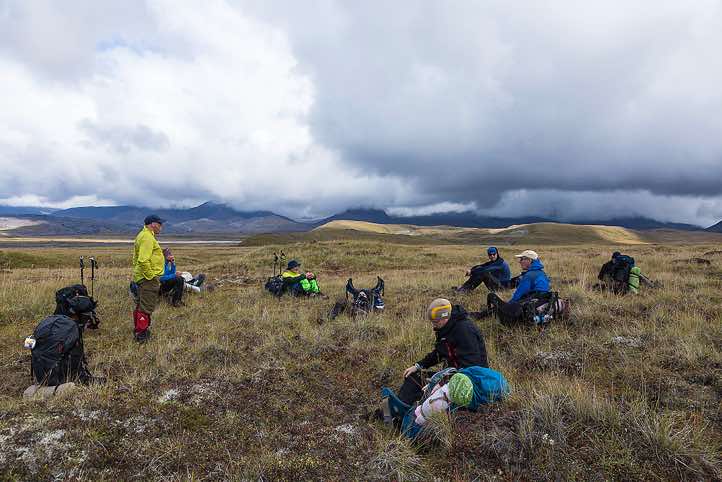 Trekking group taking a rest, around Tolbachik trek, Klyuchevskoy Nature Park