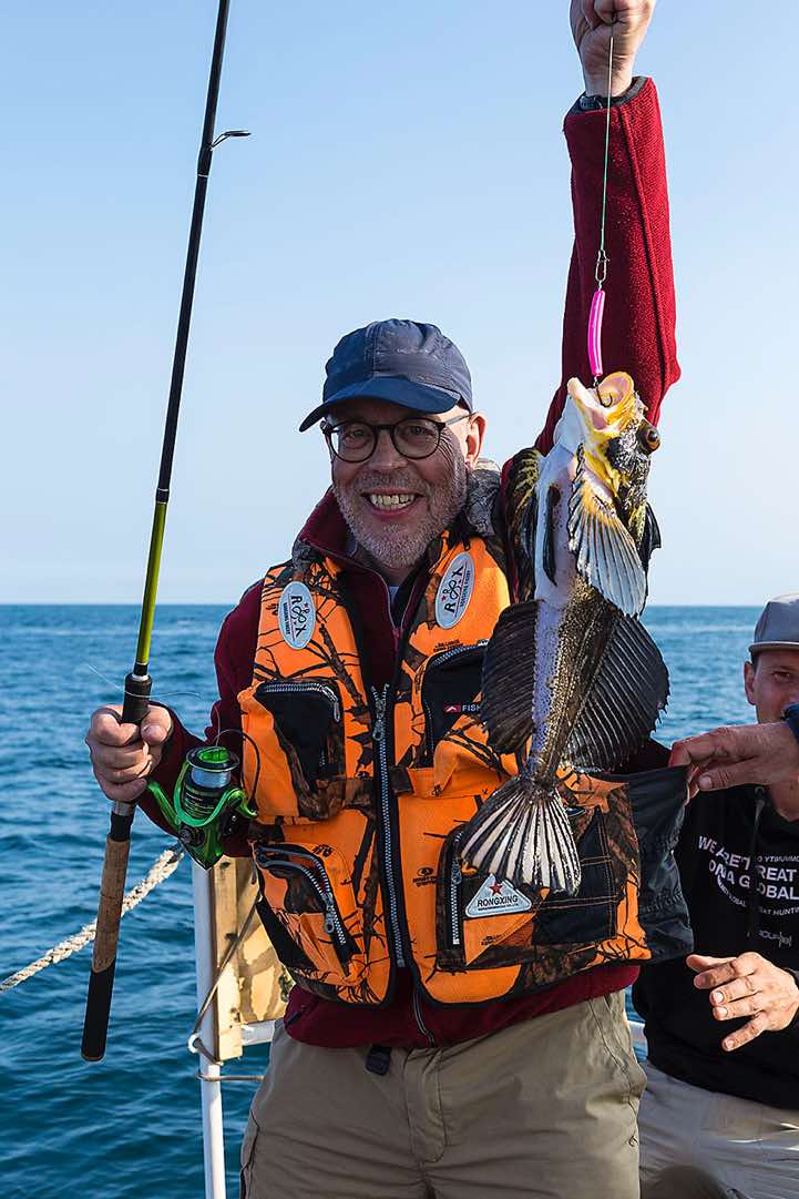 Uli successfully fishing in the Pacific Ocean